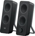 Logitech Z207 black Bluetooth computer speakers on a desk, showcasing the minimalist design.
